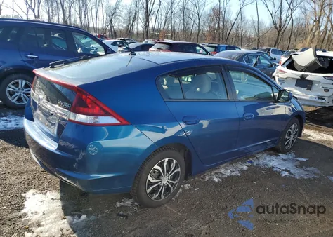 2013 Honda Insight z USA, uszkodzony, nr VIN JHMZE2H3XDS004357